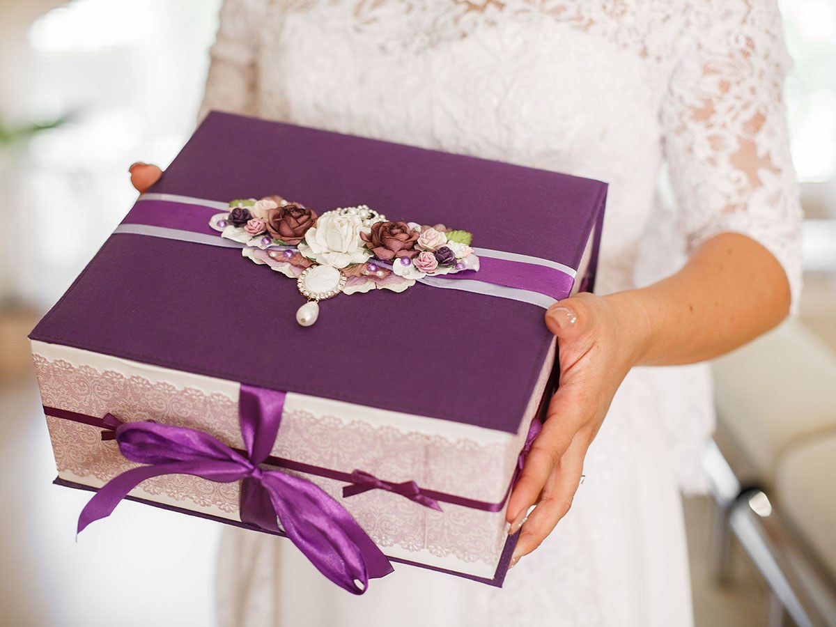 Bride holding a gift box